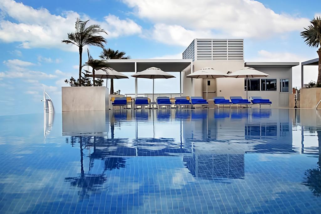 Grand Cosmopolitan Hotel Dubai 5*, Séjour Emirats Arabes Unis, Dubaï par Ôvoyages Grand Cosmopolitan Hotel Dubai 5*, Séjour Emirats Arabes Unis, Dubaï par Ôvoyages