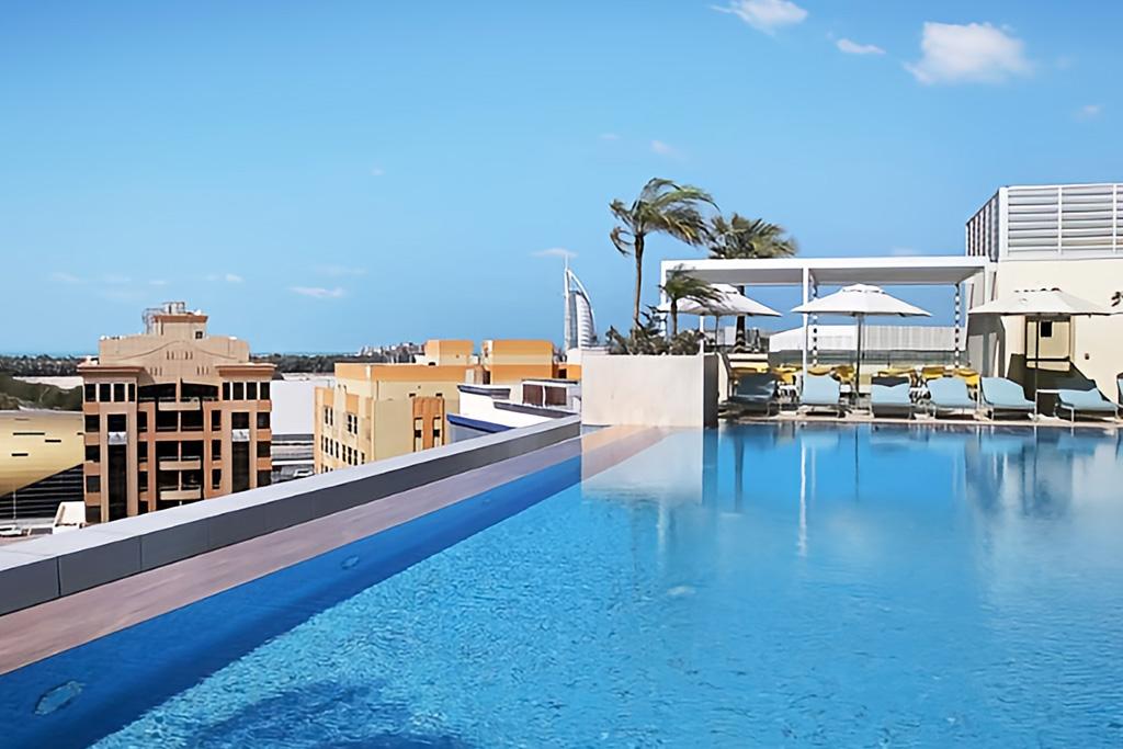 Grand Cosmopolitan Hotel Dubai 5*, Séjour Emirats Arabes Unis, Dubaï par Ôvoyages Grand Cosmopolitan Hotel Dubai 5*, Séjour Emirats Arabes Unis, Dubaï par Ôvoyages