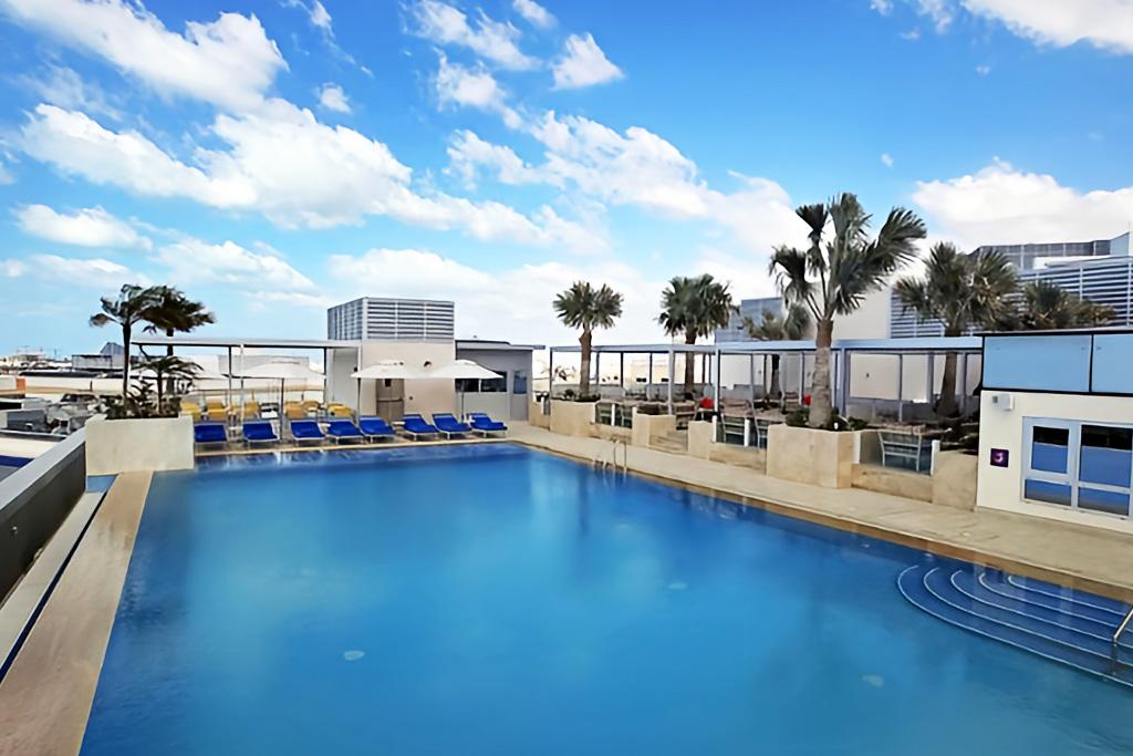 Grand Cosmopolitan Hotel Dubai 5*, Séjour Emirats Arabes Unis, Dubaï par Ôvoyages Grand Cosmopolitan Hotel Dubai 5*, Séjour Emirats Arabes Unis, Dubaï par Ôvoyages