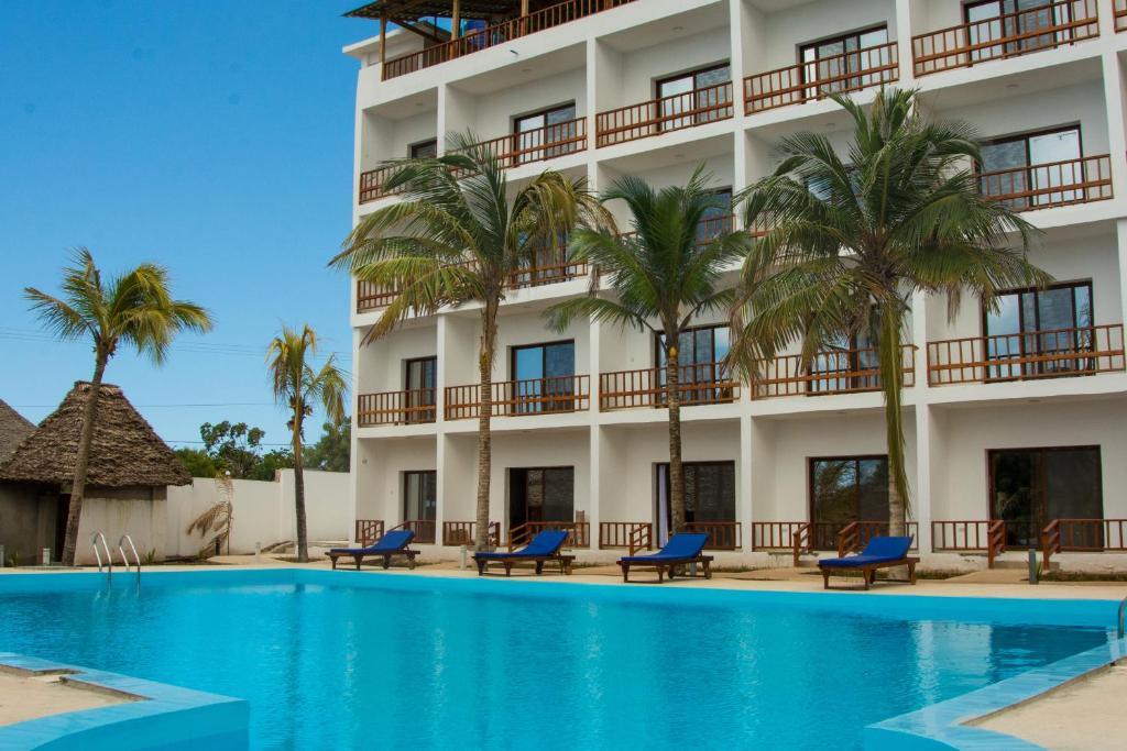 Hôtel Malika Nungwi 4* & Safari 2 Nuits, Séjour Tanzanie, Zanzibar par Ôvoyages Hôtel Malika Nungwi 4* & Safari 2 Nuits, Séjour Tanzanie, Zanzibar par Ôvoyages
