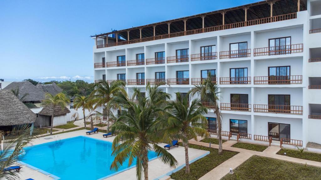 Hôtel Malika Nungwi 4* & Safari 2 Nuits, Séjour Tanzanie, Zanzibar par Ôvoyages Hôtel Malika Nungwi 4* & Safari 2 Nuits, Séjour Tanzanie, Zanzibar par Ôvoyages