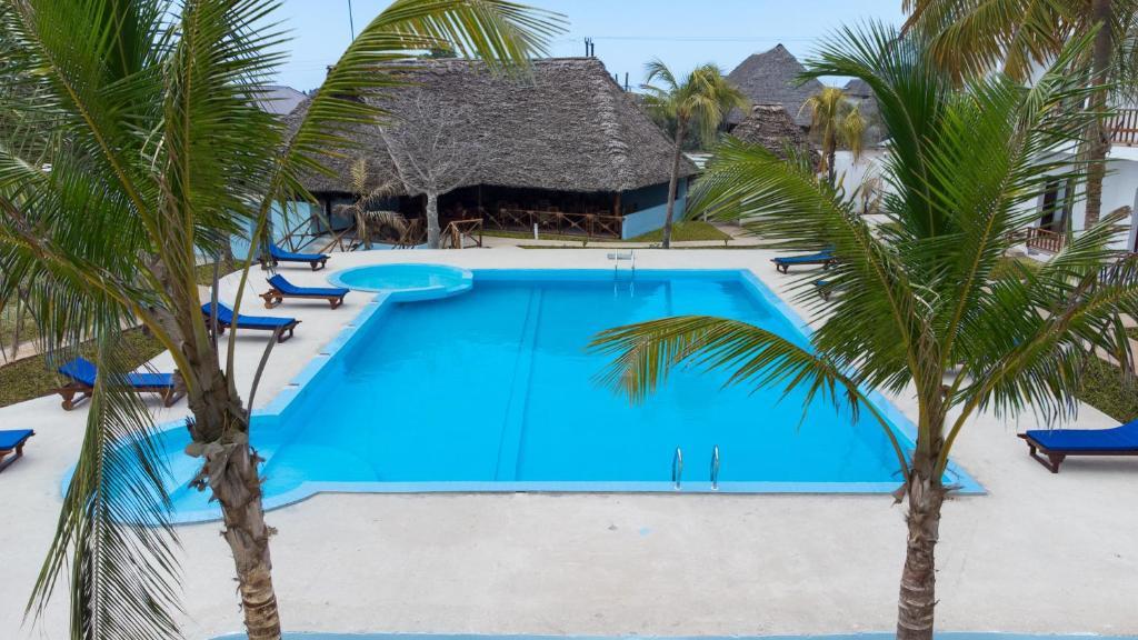 Hôtel Malika Nungwi 4* & Safari 2 Nuits, Séjour Tanzanie, Zanzibar par Ôvoyages Hôtel Malika Nungwi 4* & Safari 2 Nuits, Séjour Tanzanie, Zanzibar par Ôvoyages